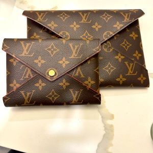 2 Nesting Louis Vuitton Clutches - date code SP2158